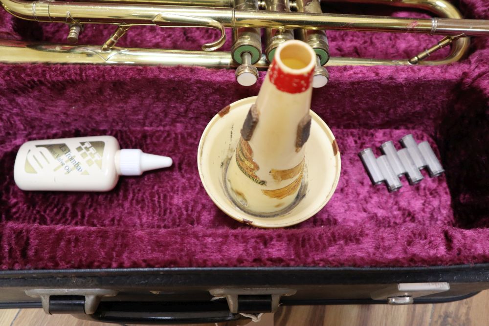 A Boosey & Hawkes Regent brass trumpet, cased